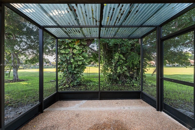 unfurnished sunroom with a wealth of natural light