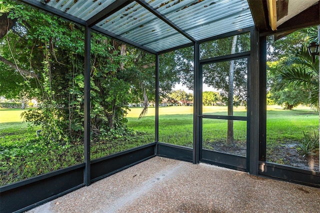 unfurnished sunroom featuring a wealth of natural light