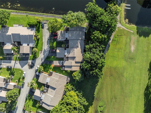 drone / aerial view with a water view