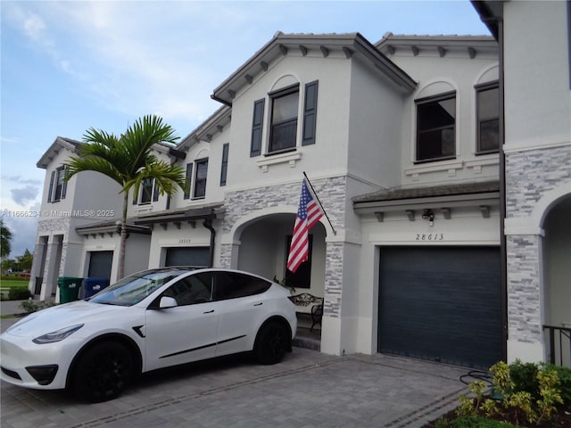 view of front of property with a garage