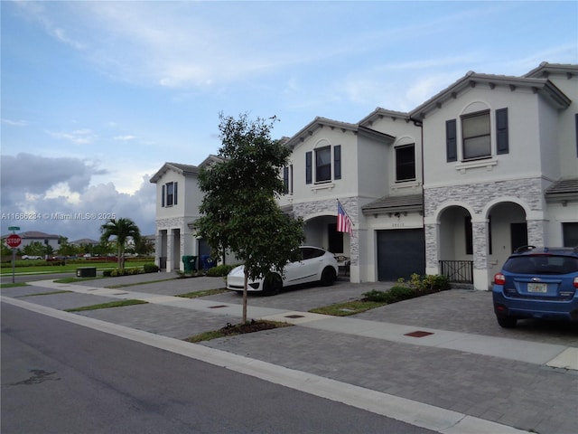 view of front of property with a garage