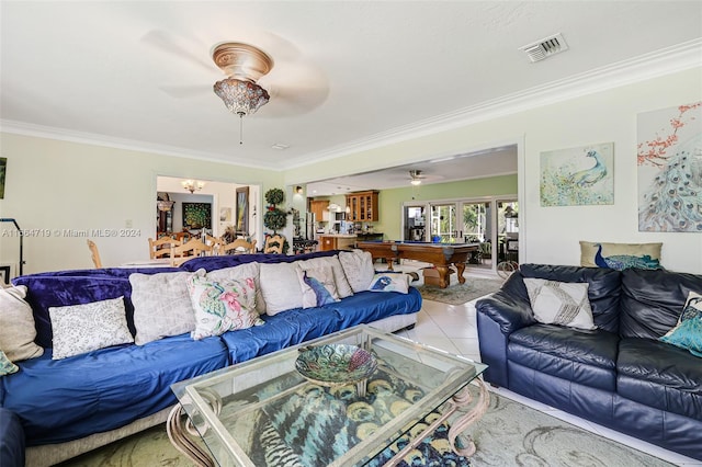 tiled living room with pool table, ornamental molding, and ceiling fan