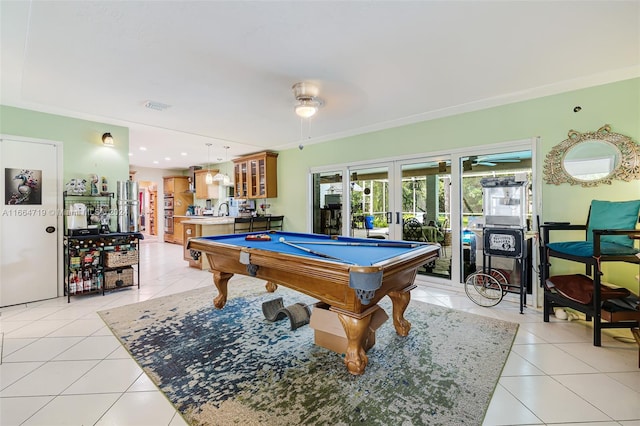 rec room featuring french doors, pool table, light tile patterned flooring, and crown molding