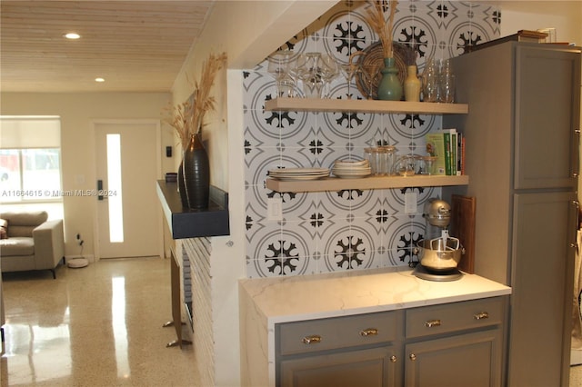 kitchen featuring gray cabinets