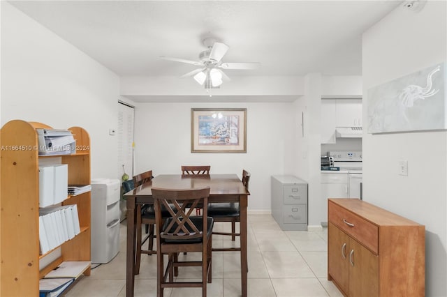 dining area with ceiling fan and light tile patterned floors