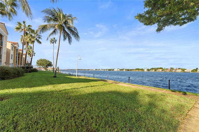 view of yard with a water view