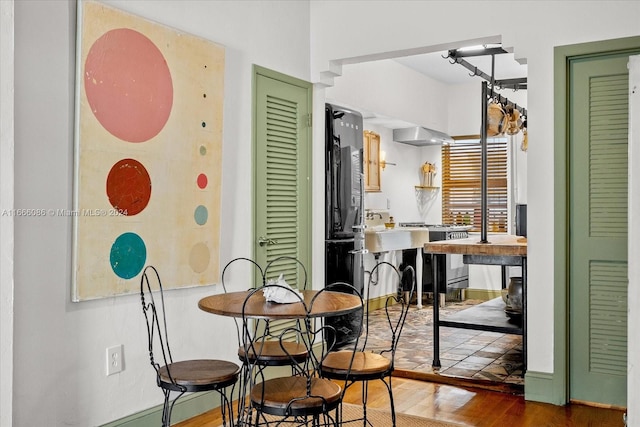 dining area featuring hardwood / wood-style floors