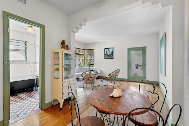 dining room featuring light wood-type flooring