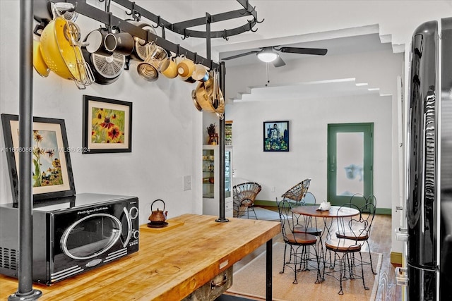 dining room featuring ceiling fan