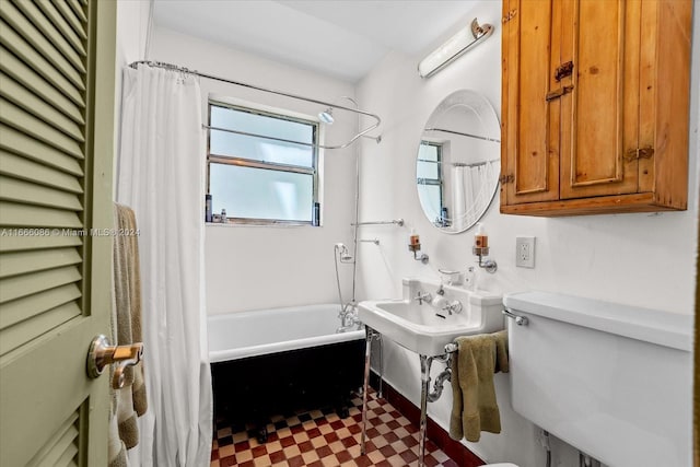 bathroom with shower / bath combo and toilet