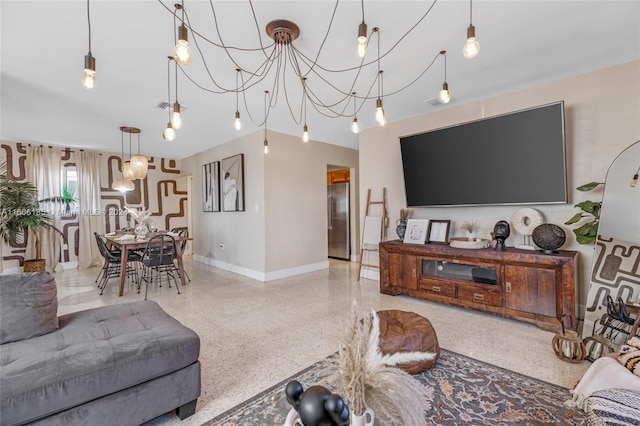 living room featuring a chandelier