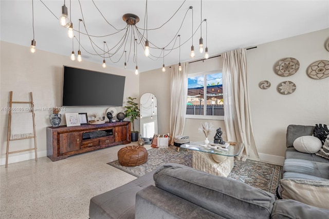 living room featuring a chandelier