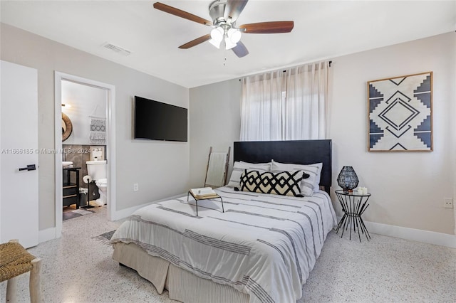 bedroom featuring connected bathroom and ceiling fan