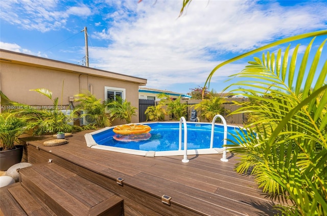 view of pool featuring a deck