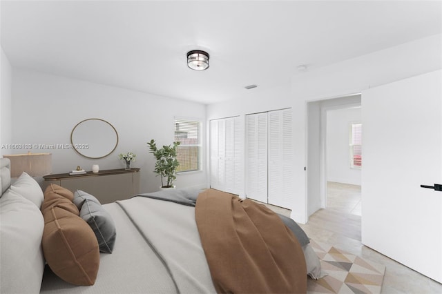 bedroom featuring visible vents