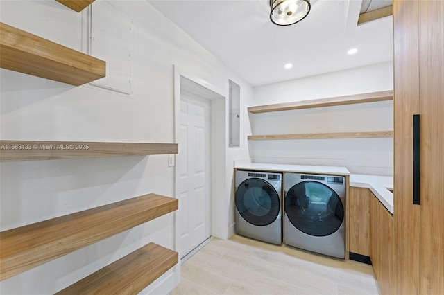 laundry area with recessed lighting, laundry area, and washing machine and clothes dryer