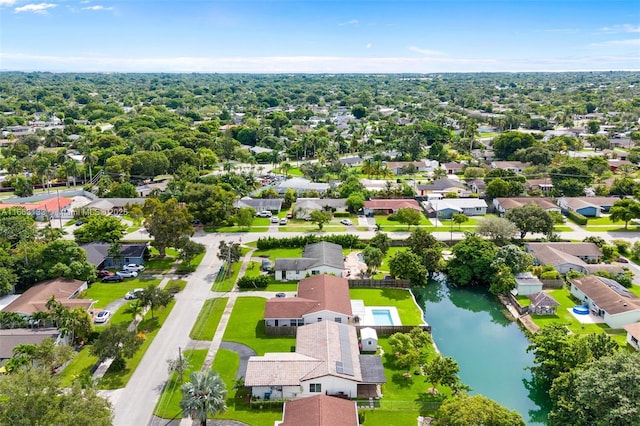 bird's eye view with a water view and a residential view