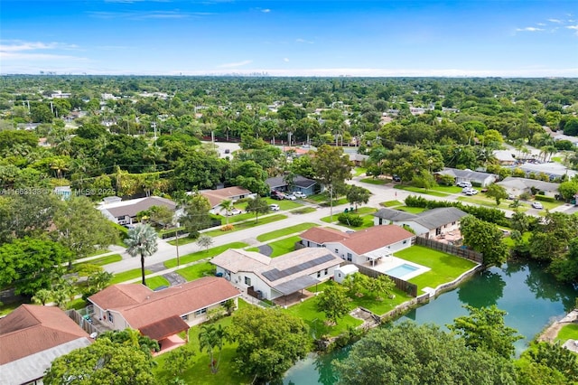 birds eye view of property featuring a residential view and a water view