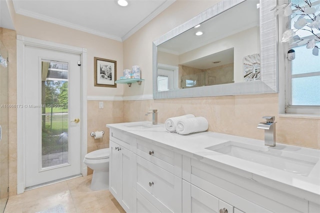 bathroom featuring crown molding, toilet, tile patterned floors, and vanity