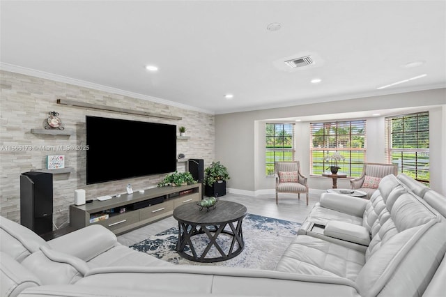 living room featuring light wood-type flooring and crown molding