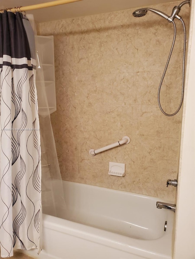 bathroom featuring shower / bathtub combination with curtain