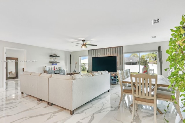 living room featuring ceiling fan