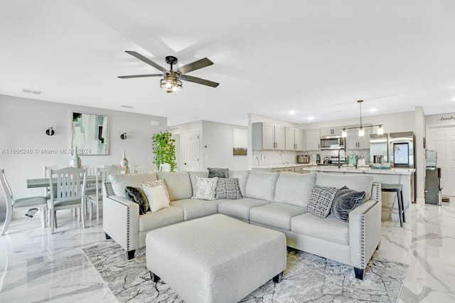 living room featuring ceiling fan