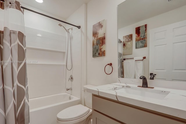 full bathroom featuring shower / bath combination with curtain, vanity, and toilet