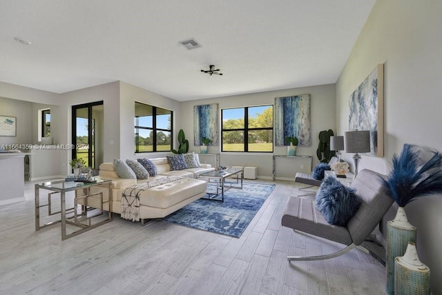 living room with light hardwood / wood-style floors