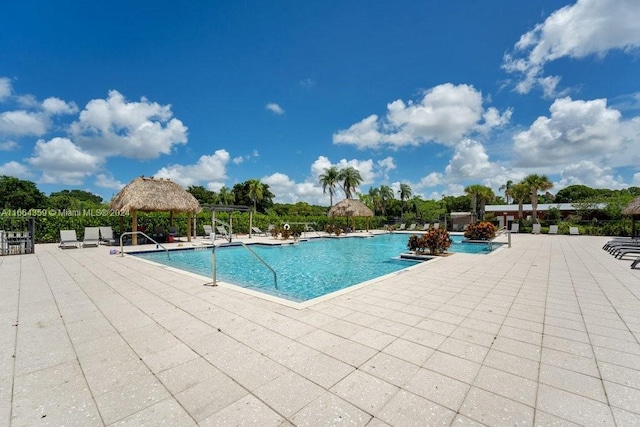 view of pool featuring a gazebo and a patio area