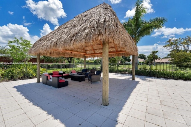 view of patio with a gazebo and an outdoor living space