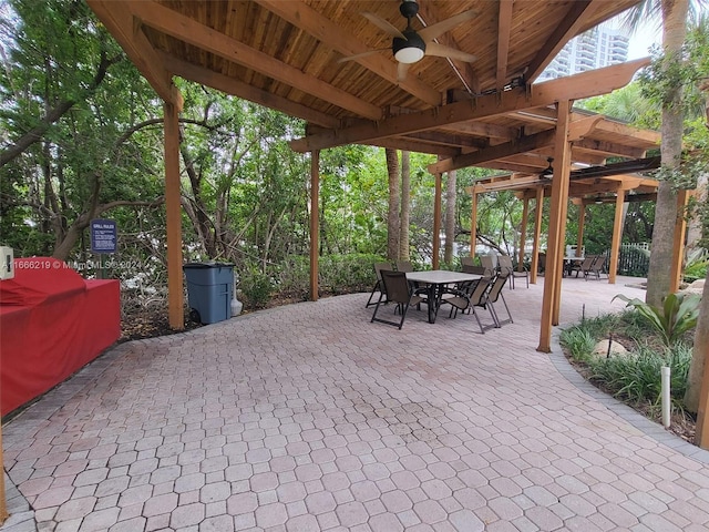 view of patio / terrace featuring a pergola and ceiling fan