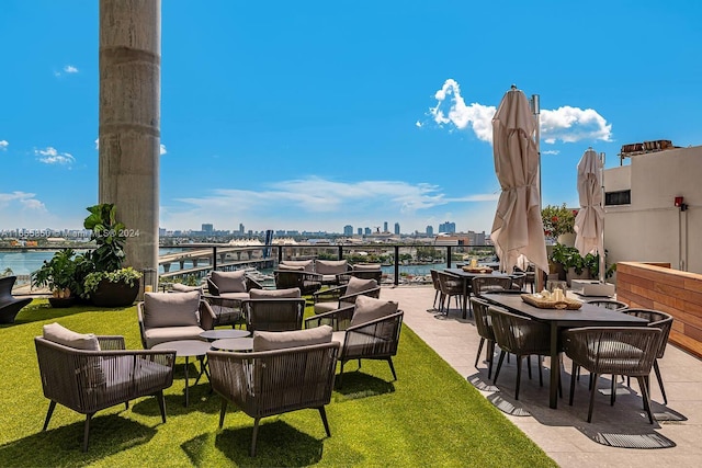 view of patio / terrace featuring a water view