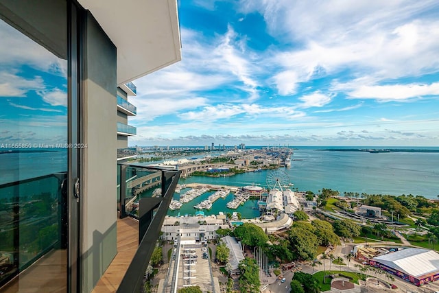 balcony featuring a water view