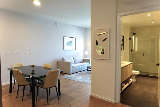 dining room with dark hardwood / wood-style floors