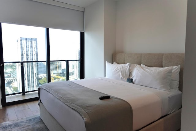 bedroom with wood-type flooring