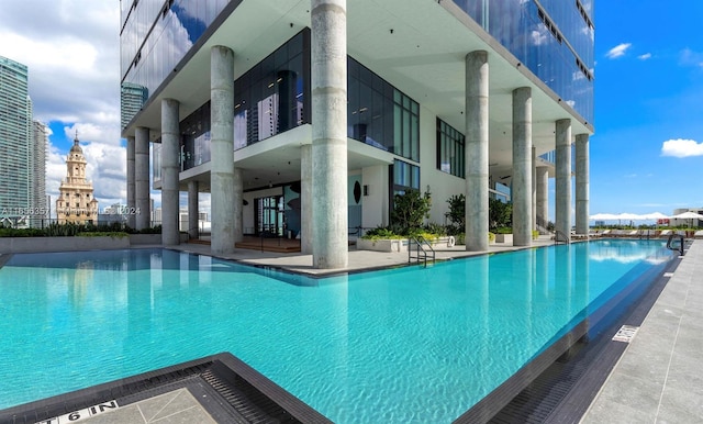 view of swimming pool with a patio area