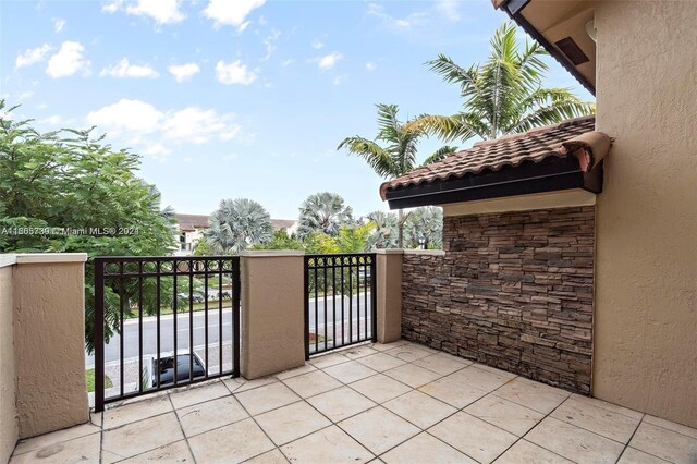 view of patio with a balcony