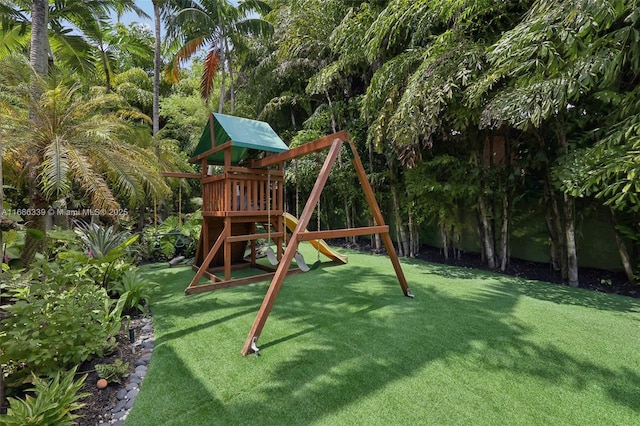 view of play area featuring a lawn