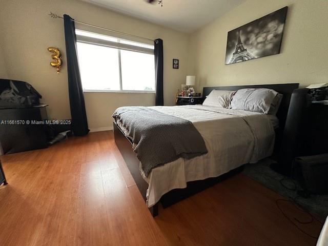 bedroom with light wood-type flooring