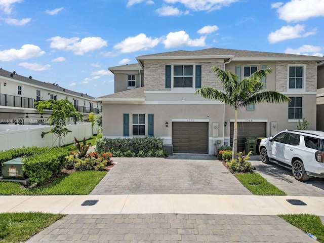 view of front of home with a garage