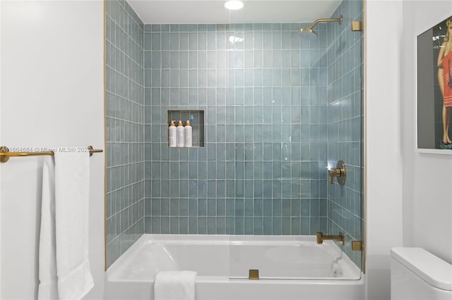 bathroom featuring toilet and shower / bath combination