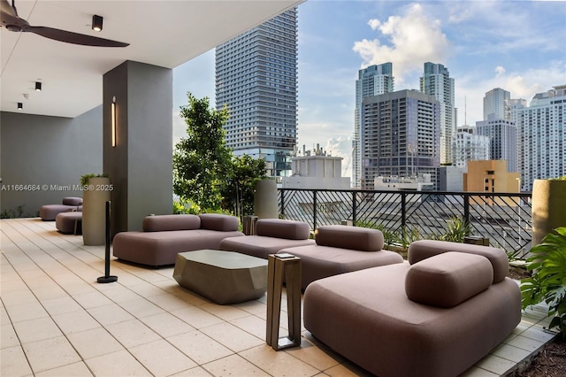 view of patio featuring ceiling fan