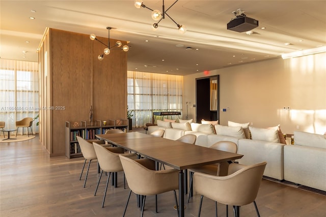 dining space featuring wood-type flooring