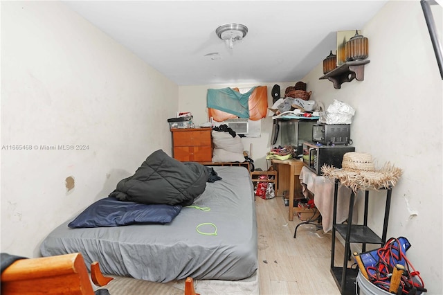 bedroom featuring light wood-type flooring