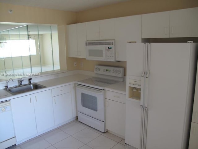 9511 Weldon Cir Unit G215, Tamarac, FL 33321 - kitchen featuring white appliances, a sink, light countertops, and white cabinets