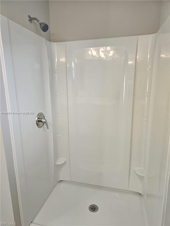 bathroom with walk in shower