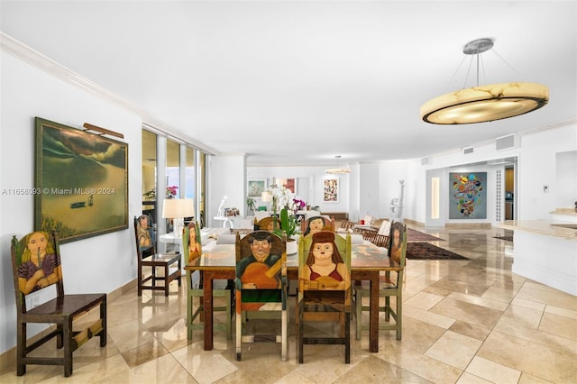 dining room with ornamental molding