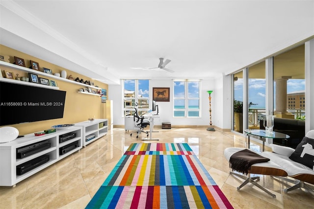 interior space featuring a wall of windows and ceiling fan