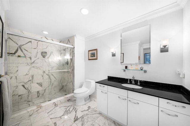 bathroom with ornamental molding, a shower with door, vanity, and toilet